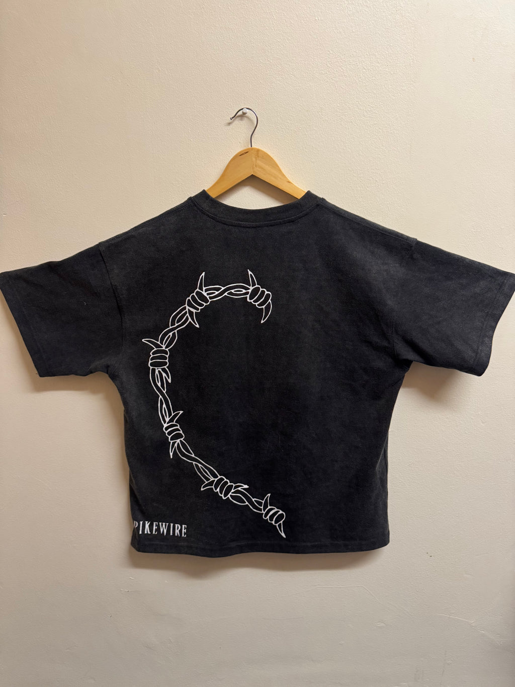 Spike crescent tee