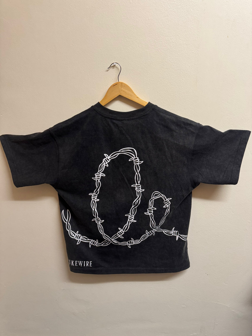 Spike loop tee