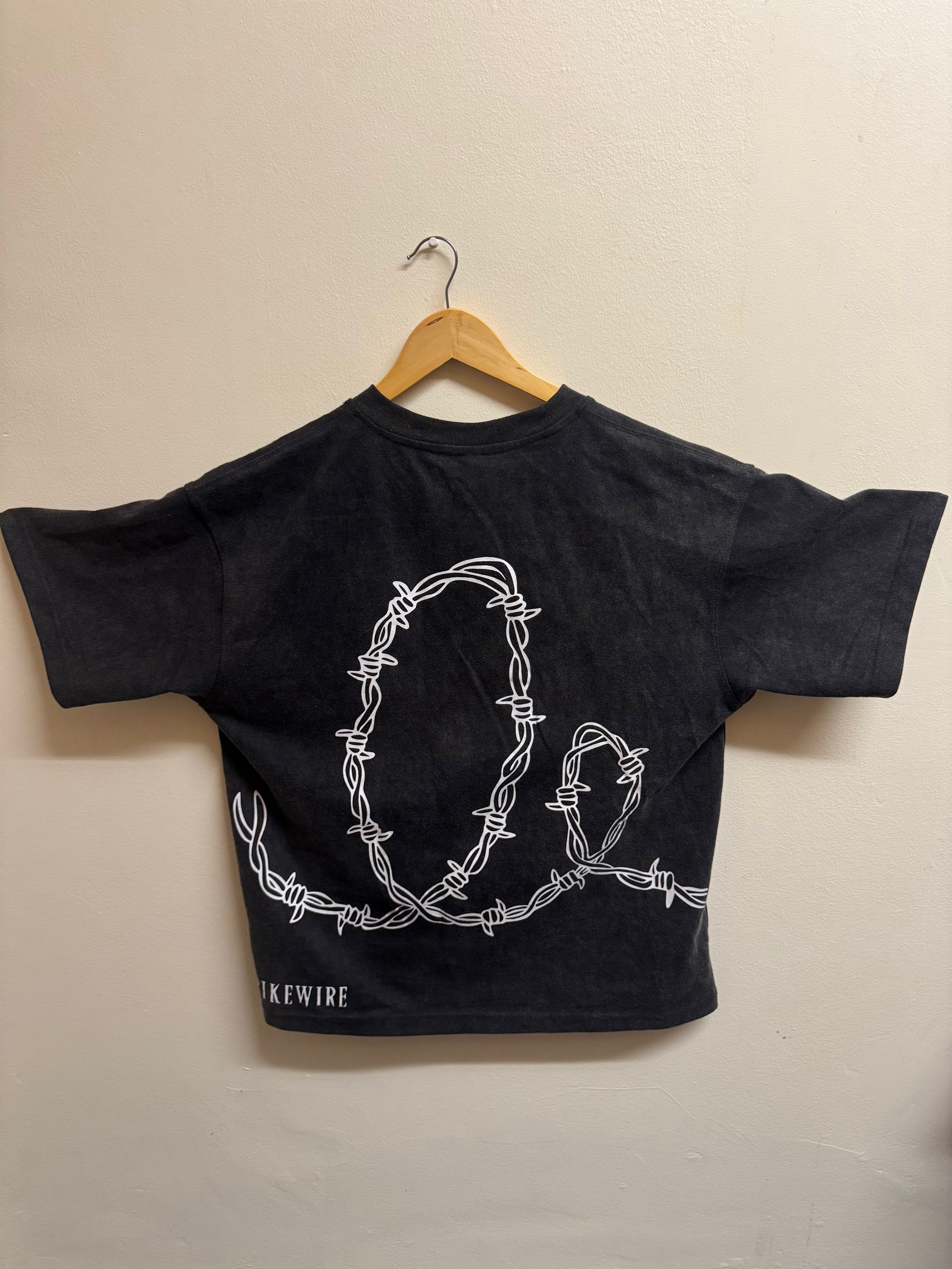 Spike loop tee